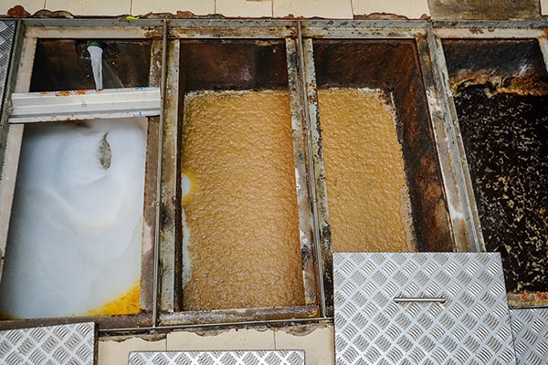 proper grease trap maintenance helps prevent grease and food waste from entering the sewer system and harming the environment